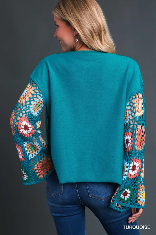 Umgee French Terry Top with Long Colorful Crocheted Sleeves in Turquoise